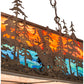 Meyda Lighting Deer at Dusk 54" 6-Light Antique Copper Island Pendant Light With Multi-Colored Shade Glass