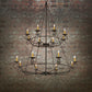 Meyda Lighting Estrella 54" 16-Light 2-Tier Textured Black Chandelier With Amber Faux Candlelight
