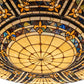 Meyda Lighting Fleur-de-lis 80" 12-Light Copper Vein & Gold Flush Mount Light With Multi-Colored Stained Shade Glass