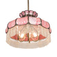 Meyda Lighting Frederick 24" 11-Light Antique Brass Pendant Light With Pink Iridescent Shade Glass