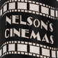 Meyda Lighting Nelson's Cinema 10" 2-Light Textured Black Tinseltown Filmstrip Personalized Wall Sconce With Arctic Idalight Shade
