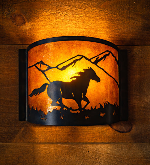 Meyda Lighting Running Horses 12" Dark Burnished Antique Copper Wall Sconce With Amber Mica Shade Glass