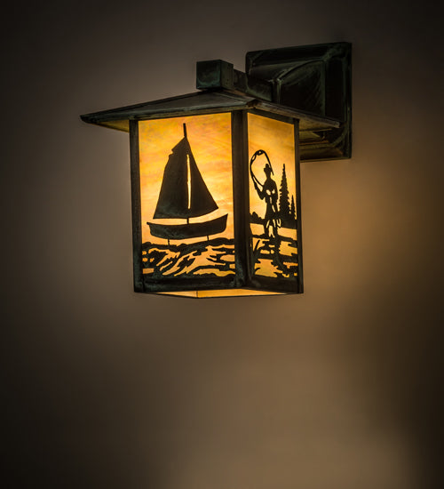 Meyda Lighting Seneca 7" Verdigris Sailboat & Fly Fisherman Solid Mount Wall Sconce With Beige Iridescent Shade Glass