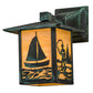 Meyda Lighting Seneca 7" Verdigris Sailboat & Fly Fisherman Solid Mount Wall Sconce With Beige Iridescent Shade Glass