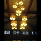 Meyda Lighting Sequoia 60" 14-Light 14-Arm Antique Copper Chandelier With Beige Textrene Shade