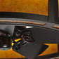 Meyda Lighting Smythe Craftsman 37" LED Strip Oil Rubbed Bronze Chandelier With Amber Mica Shade Glass and Black Fan