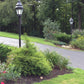 Meyda Lighting Statesboro 14" 2-Light Craftsman Brown Street Post Light With Clear Ripple Shade Glass