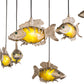 Meyda Lighting Tiervis 56" 9-Light Cascading Pendant Light With Amber Fused Shade Glass