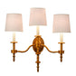Meyda Lighting Toby 22" 3-Light Brass Tint Wall Sconce With Cream Textrene Shade