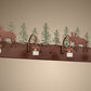 Meyda Lighting Wandering Moose 35" 4-Light Rust & Green Trees Vanity Light With White Shade Glass