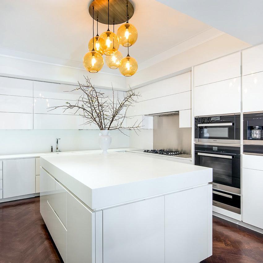 Niche Modern Solitaire 10" Dimmable LED Edison Bulb Pendant Light With Amber Glass Shade