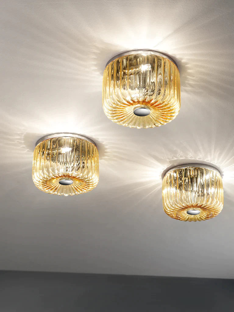 Sylcom Mask 0120-K-AS Submerged Amber Wall Lamp in Polish Chrome Metal Finish