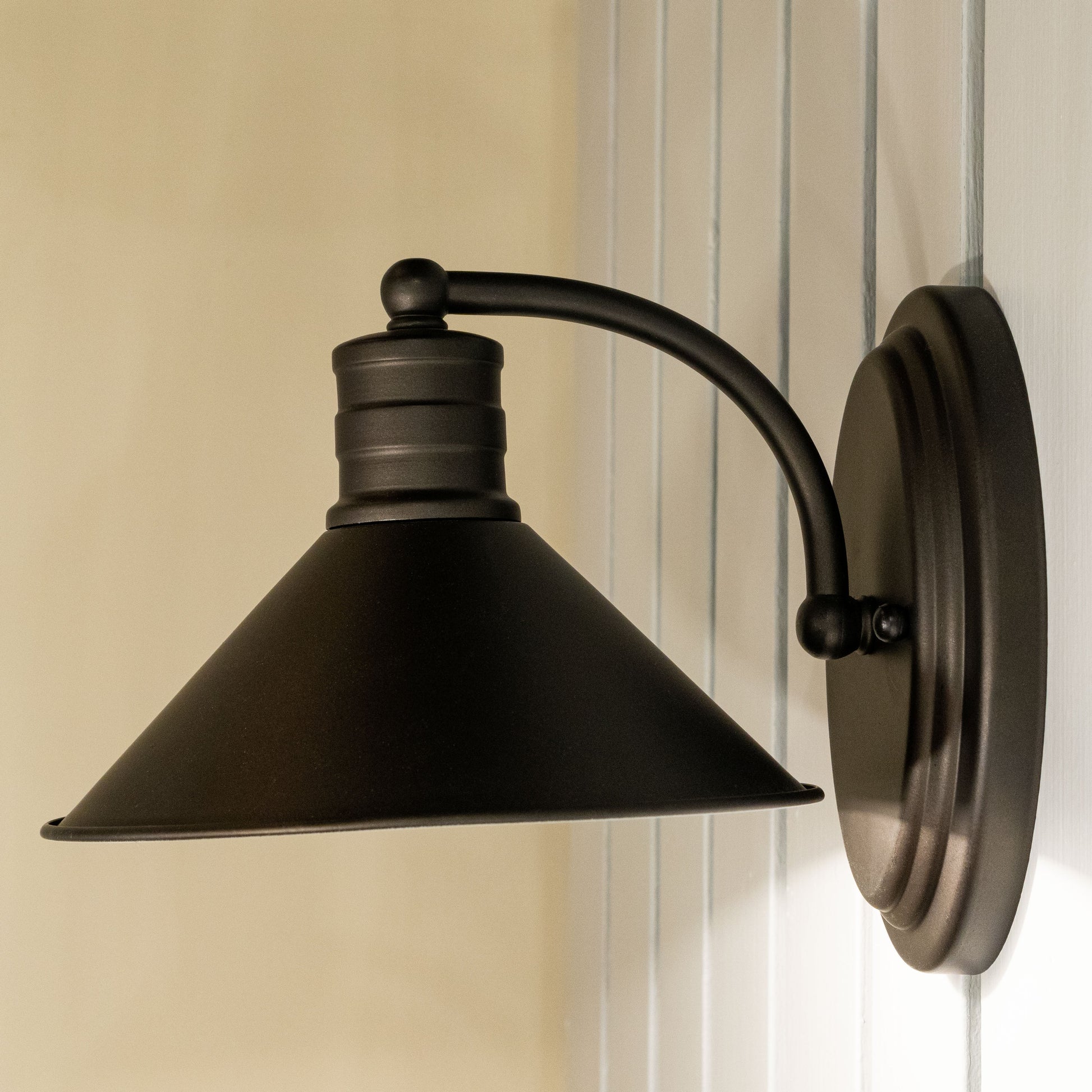 Vaxcel Akron 8" 1-Light Oil Rubbed Bronze and Matte White Vanity Wall Sconce With Metal Shade