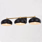 Vaxcel Belmont 28" 3-Light Black and Brass Mid-Century Modern Bathroom Vanity Wall Light With Black Metal Dome Shades