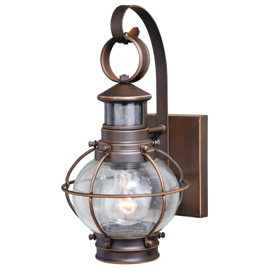 Vaxcel Chatham 7" 1-Light Bronze Motion Sensor Dusk-to-Dawn Coastal Outdoor Wall Light With Clear Seeded Glass Shade