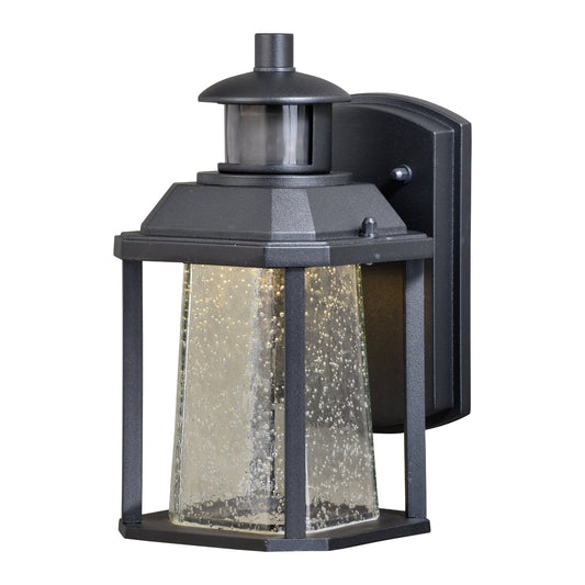 Vaxcel Freeport 6" 1-Light Textured Black Dusk-to-Dawn LED Outdoor Wall Light With Motion Sensor and Clear Seeded Glass Shade