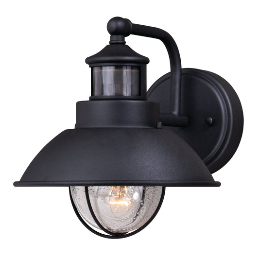 Vaxcel Harwich 8" 1-Light Textured Black Motion Sensor Dusk-to-Dawn Coastal Outdoor Wall Light With Clear Seeded Glass Shade