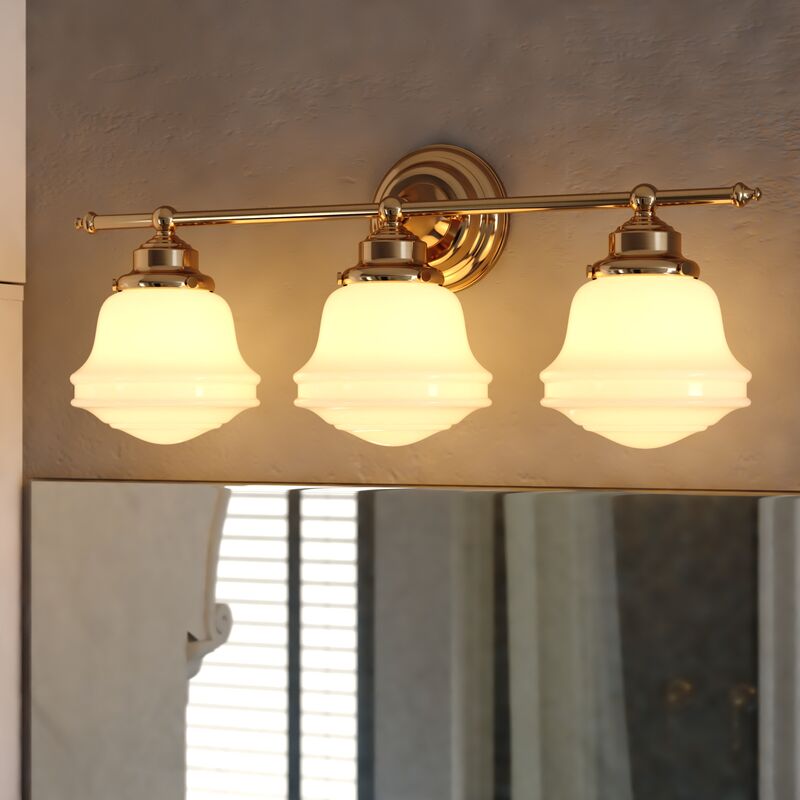 Vaxcel Huntley 3 Light Vanity Natural Brass