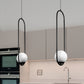 Vonn Lighting Capri 7" Black Integrated LED Pendant With Frosted White Glass Shade