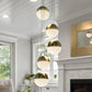 Vonn Lighting Ravello 10" 5-Light Brass Integrated LED Round Chandelier With White Acrylic Shades