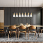 Z-Lite Aimie 7-Light Candelabra Bulb Base Modern Gold Steel Frame Feathered White Glass Shade Linear Chandelier