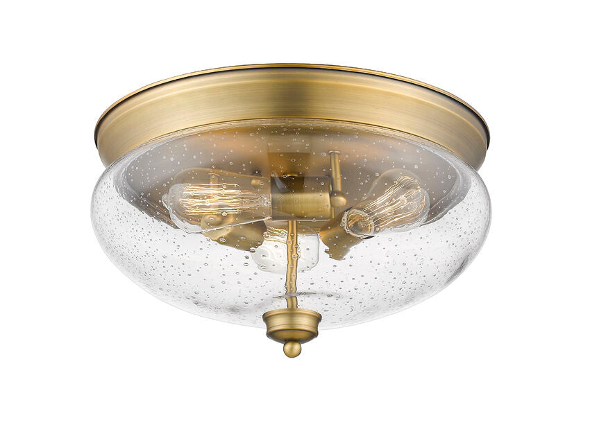 Z-Lite Amon 15" 3-Light Heritage Brass Flush Mount Lighting With Clear Seedy Glass Shade