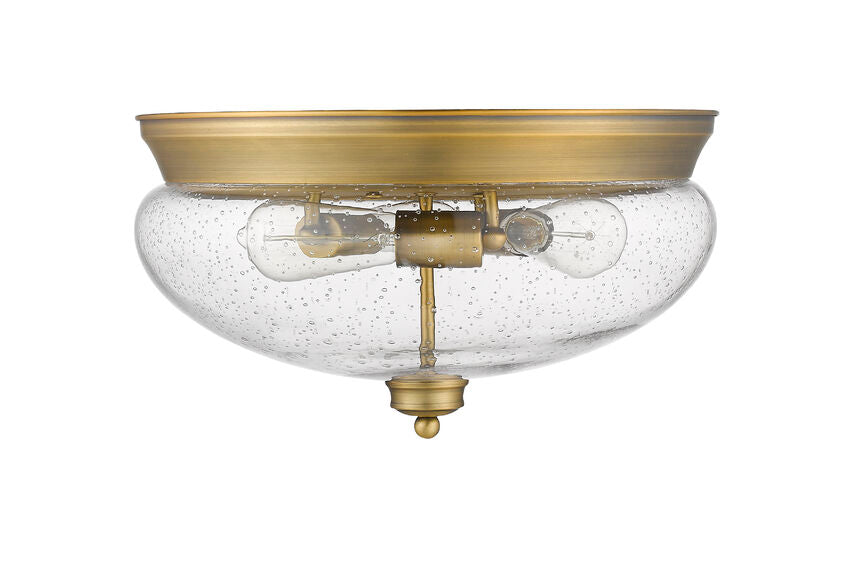 Z-Lite Amon 15" 3-Light Heritage Brass Flush Mount Lighting With Clear Seedy Glass Shade