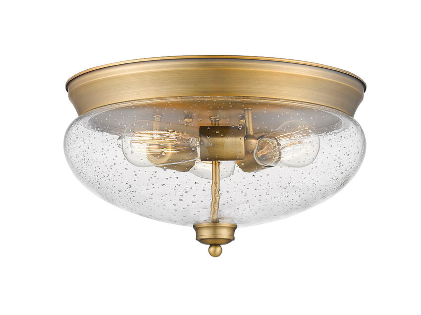 Z-Lite Amon 15" 3-Light Heritage Brass Flush Mount Lighting With Clear Seedy Glass Shade