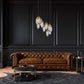 Z-Lite Arden 24" 11-Light Rubbed Brass Clear Glass Shade Chandelier