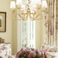 Z-Lite Aslin 31" 6-Light Gold Leaf Steel Frame White Fabric Shade Chandelier