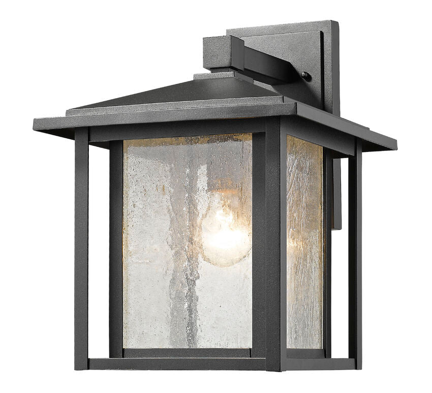Z-Lite Aspen 12" 1-Light Black Outdoor Wall Sconce With Clear Seedy Glass Shade
