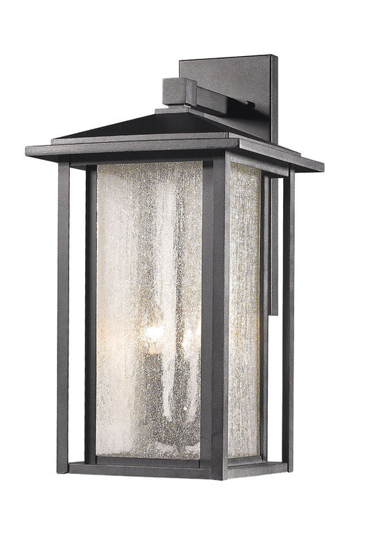 Z-Lite Aspen 12" 3-Light Black Outdoor Wall Sconce With Clear Seedy Glass Shade