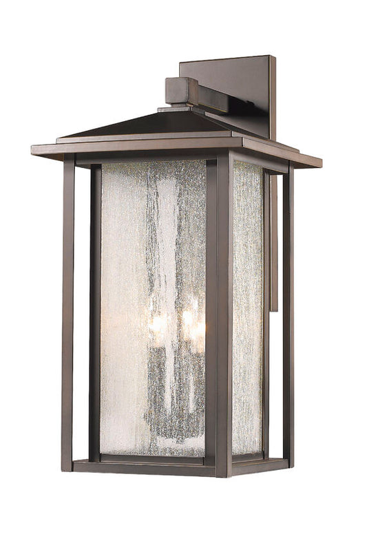 Z-Lite Aspen 12" 3-Light Oil Rubbed Bronze Outdoor Wall Sconce With Clear Seedy Glass Shade