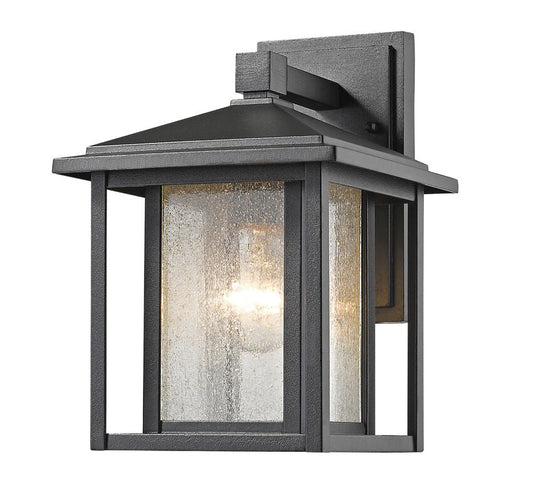 Z-Lite Aspen 9" 1-Light Black Aluminum Outdoor Wall Sconce With Clear Seedy Glass Shade