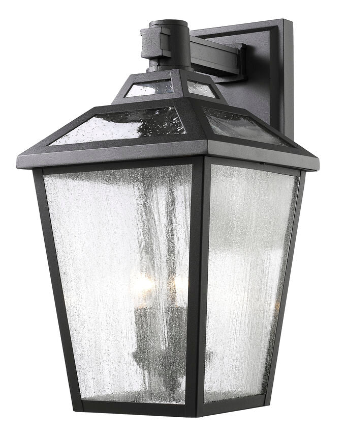 Z-Lite Bayland 11" 3-Light Black Outdoor Wall Sconce With Clear Seedy Glass Shade
