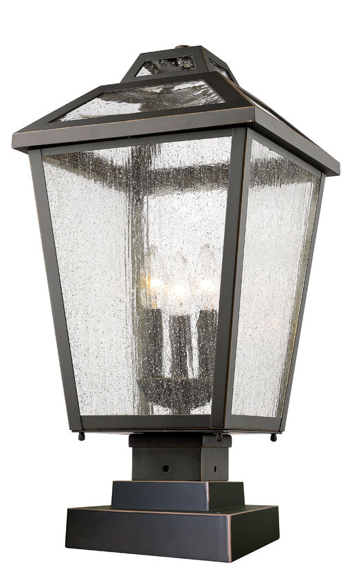 Z-Lite Bayland 11" W x 22" H 3-Light Oil Rubbed Bronze Outdoor Pier Mounted Fixture and Square Pier Mount Hardware With Clear Seedy Glass Shade