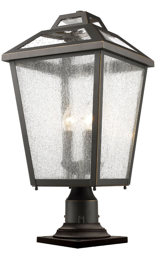 Z-Lite Bayland 11" W x 23" H 3-Light Oil Rubbed Bronze Outdoor Pier Mounted Fixture and Square Pier Mount Hardware With Clear Seedy Glass Shade