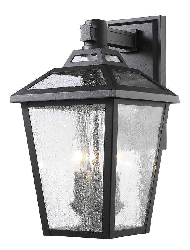 Z-Lite Bayland 9" 3-Light Black Outdoor Wall Sconce With Clear Seedy Glass Shade