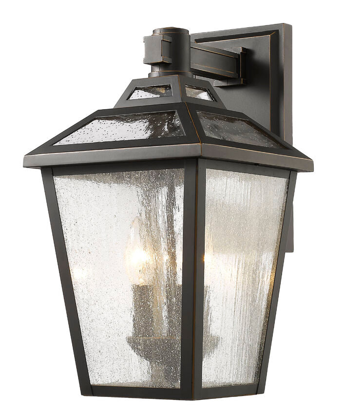Z-Lite Bayland 9" 3-Light Oil Rubbed Bronze Outdoor Wall Sconce With Clear Seedy Glass Shade