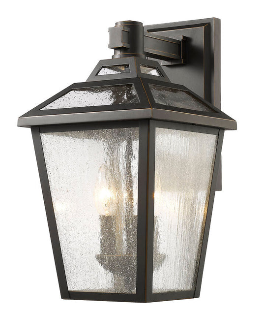 Z-Lite Bayland 9" 3-Light Oil Rubbed Bronze Outdoor Wall Sconce With Clear Seedy Glass Shade