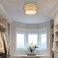 Z-Lite Bentley 12" 1-Light LED-Integrated Modern Gold Steel Frame White Acrylic Shade Flush Mount Lighting