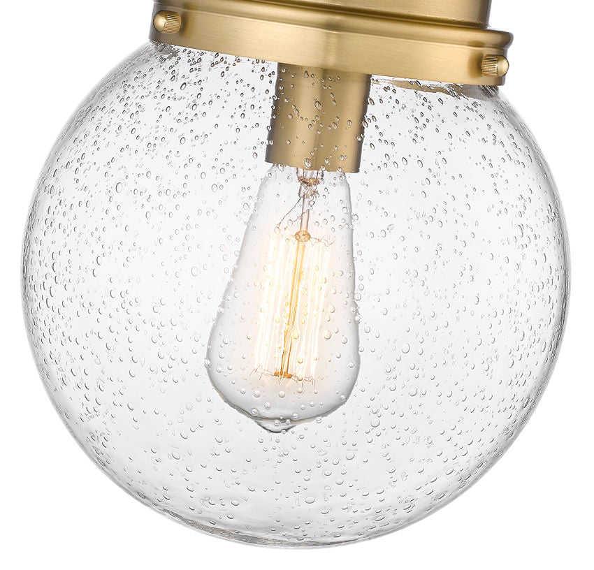 Z-Lite Calhoun 9" 1-Light Heritage Brass and Clear Seedy Glass Shade Flush Mount Lighting