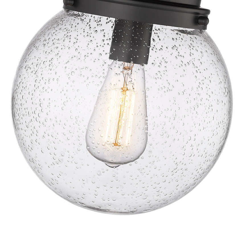 Z-Lite Calhoun 9" 1-Light Matte Black and Clear Seedy Glass Shade Flush Mount Lighting