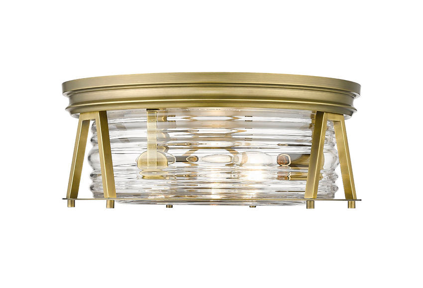 Z-Lite Cape Harbor 16" 3-Light Rubbed Brass Flush Mount Lighting With Clear Glass Shade