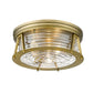 Z-Lite Cape Harbor 16" 3-Light Rubbed Brass Flush Mount Lighting With Clear Glass Shade