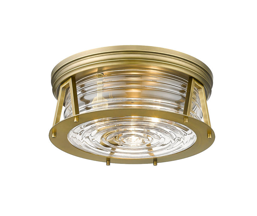 Z-Lite Cape Harbor 16" 3-Light Rubbed Brass Flush Mount Lighting With Clear Glass Shade