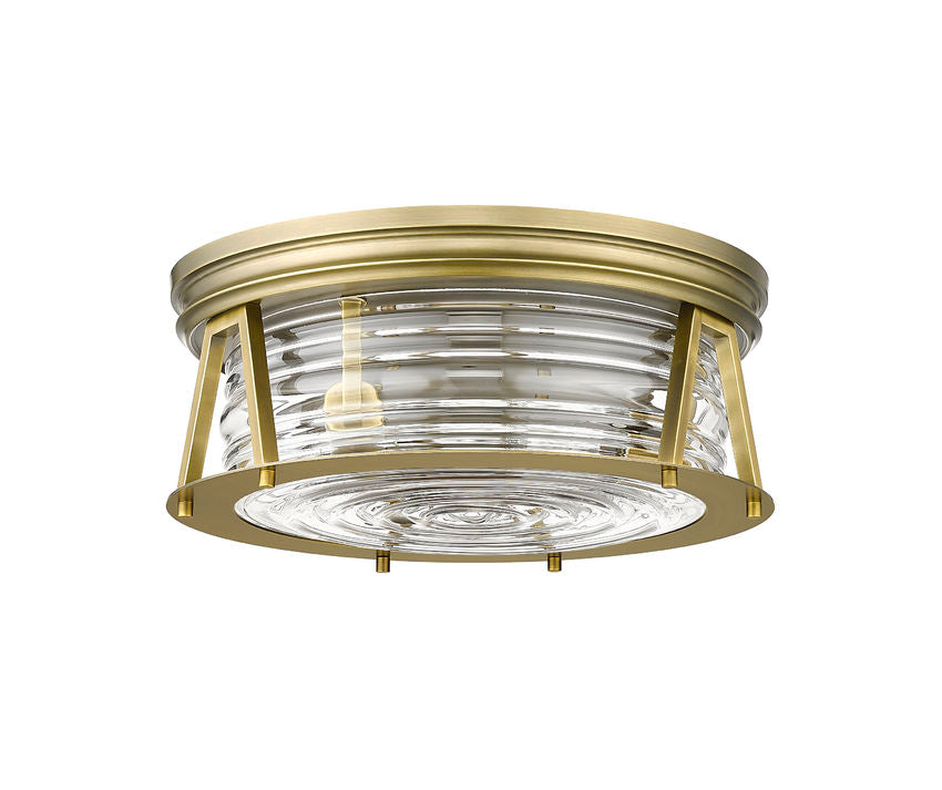 Z-Lite Cape Harbor 16" 3-Light Rubbed Brass Flush Mount Lighting With Clear Glass Shade