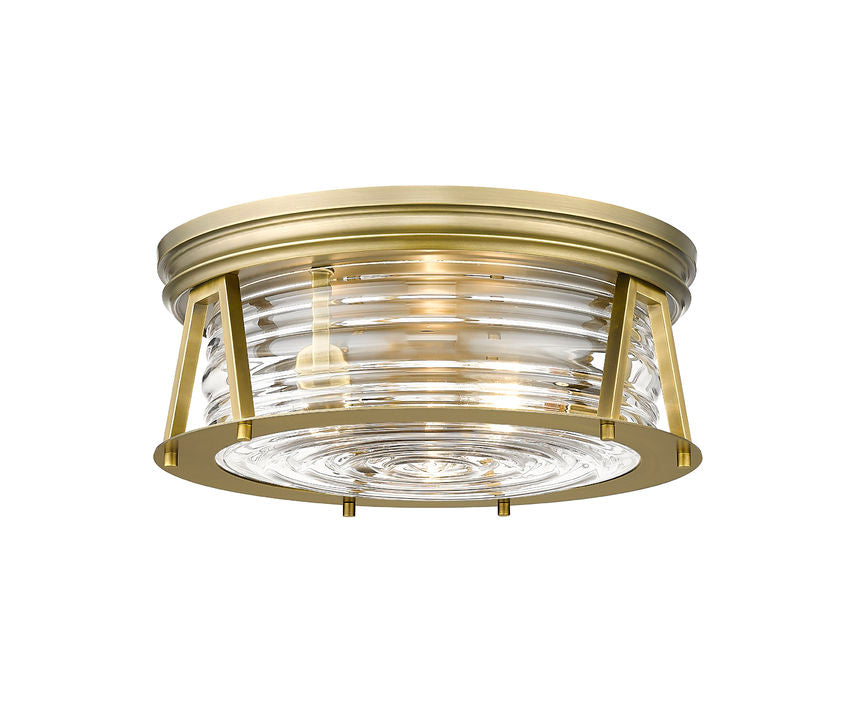 Z-Lite Cape Harbor 16" 3-Light Rubbed Brass Flush Mount Lighting With Clear Glass Shade