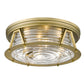 Z-Lite Cape Harbor 20" 4-Light Rubbed Brass Flush Mount Lighting With Clear Glass Shade