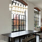Z-Lite Cayden 18" 17-Light Modern Gold and Clear With Etched Opal Glass Shade Linear Chandelier
